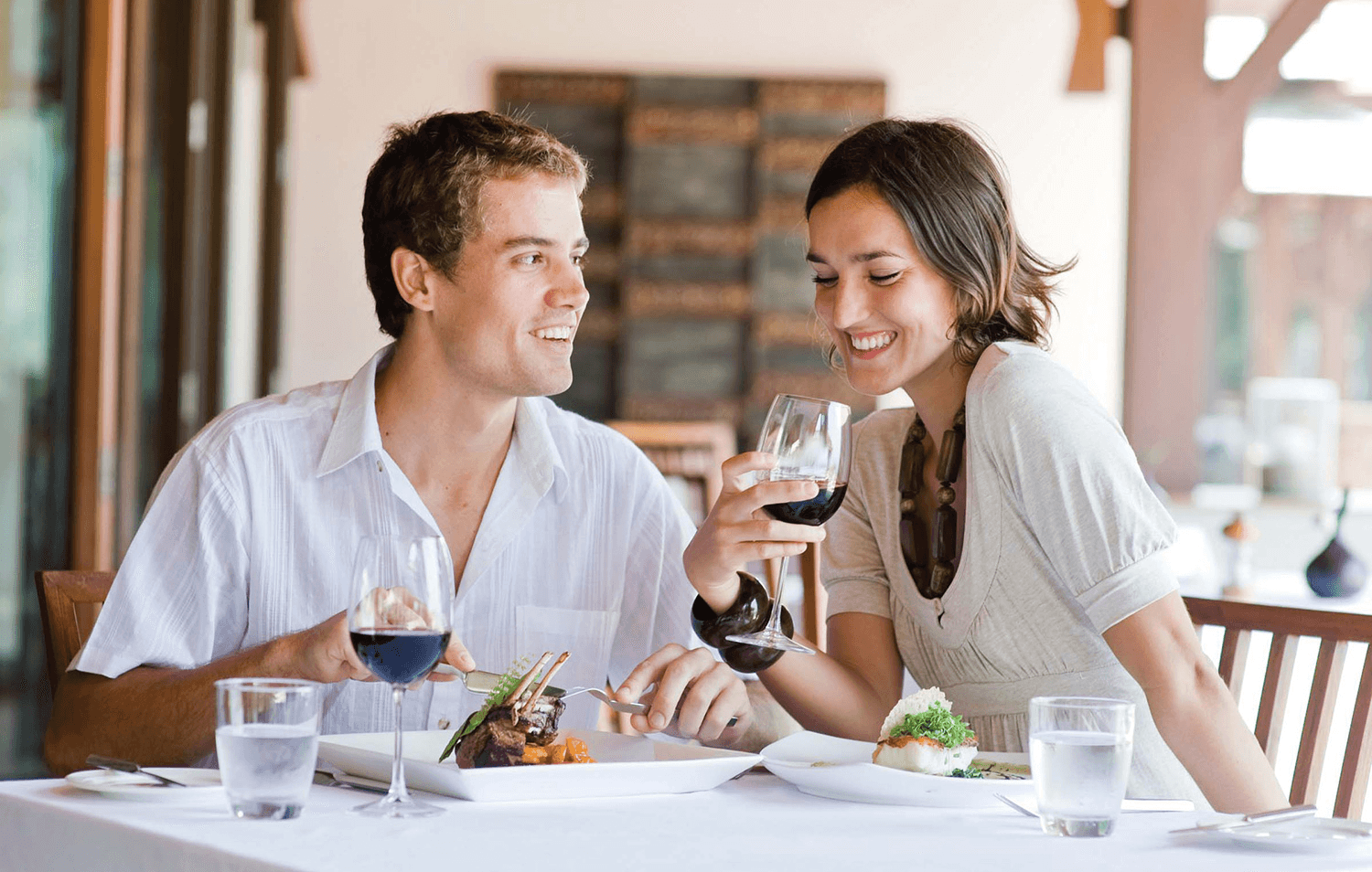 cover image of two person dining at a fancy restaurant